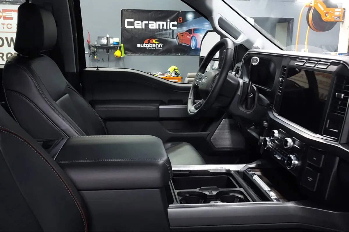 Auto detailing interior with refreshed seats, console, and trim showing a fully cleaned vehicle cabin.
