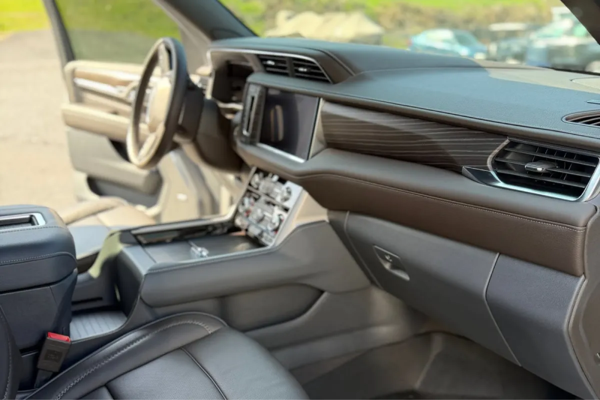Auto detailing interior cleaning showing a clean, refined dashboard and center console for a fully detailed vehicle.