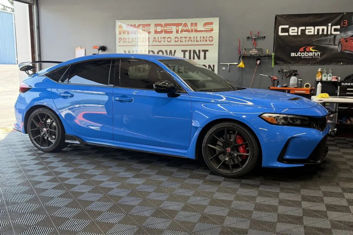Blue Honda Civic with a glossy ceramic coating finish.